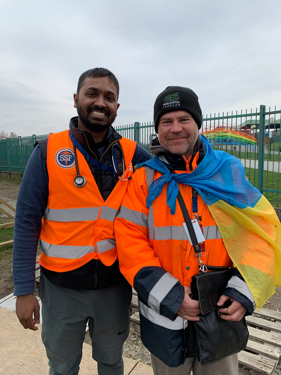 Dr. Chaitanya Rojulpote of Scranton, a second-year internal medicine resident at the Wright Center for Graduate Medical Education, poses with Sasha, a Ukrainian refugee who greets people at the border gate between Medyka, Poland and Ukraine.